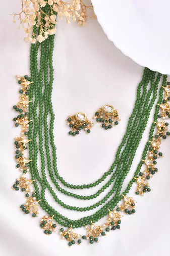 green beaded gold-plated bridal jewellery set with pearls