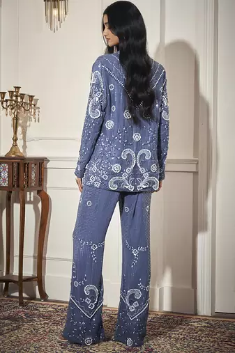 Blue satin embroidered blazer paired with bustier & pant