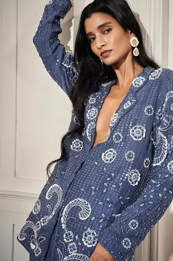 Blue satin embroidered blazer paired with bustier & pant