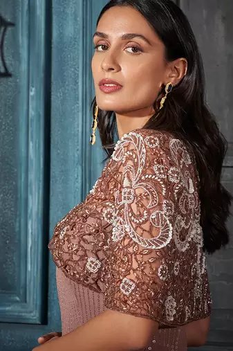 Rose gold net embroidered top paired with pant & cape