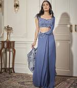 Blue georgette plain saree with embroidered blouse