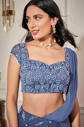 Blue georgette plain saree with embroidered blouse