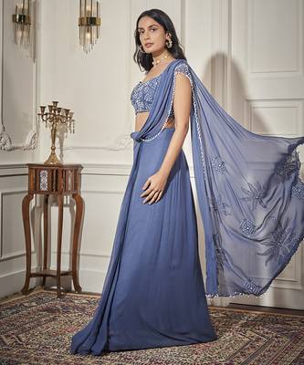 Blue georgette plain saree with embroidered blouse 3