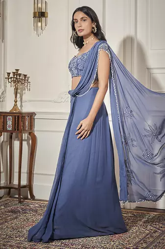 Blue georgette plain saree with embroidered blouse