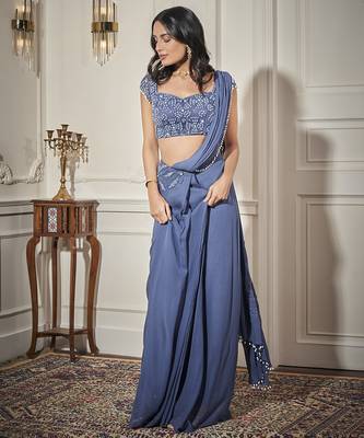 Blue georgette plain saree with embroidered blouse 4