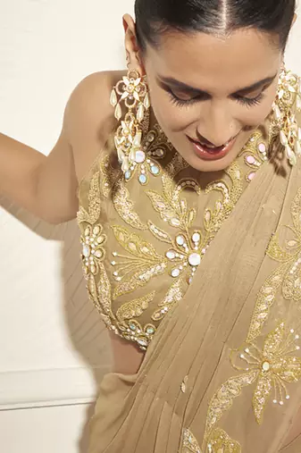 Gold georgette embroidered saree with blouse