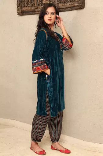 Teal crushed embroidered velvet kurta set with stripe modal silk harem pants