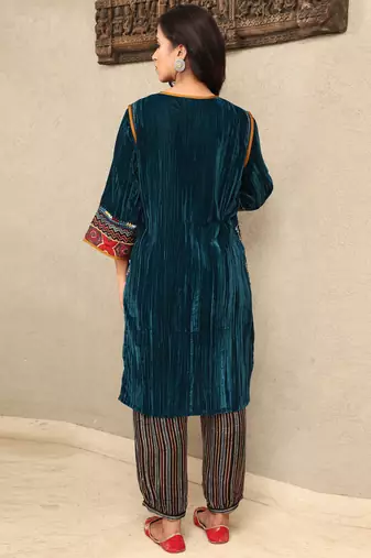 Teal crushed embroidered velvet kurta set with stripe modal silk harem pants