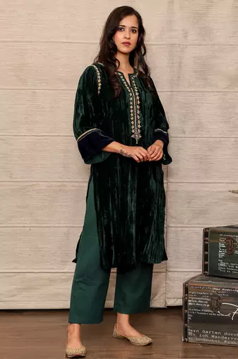 Dark green embroidered velvet silk kurta with mashru silk pants, stitched