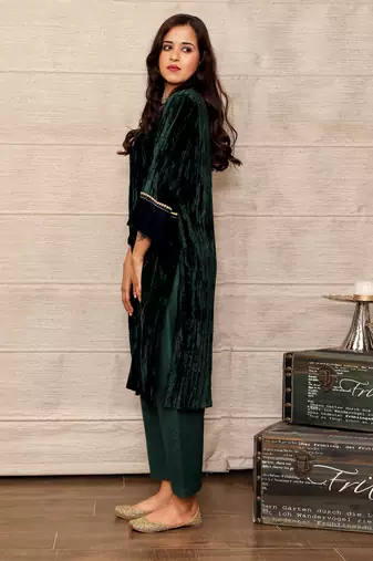 Dark green embroidered velvet silk kurta with mashru silk pants