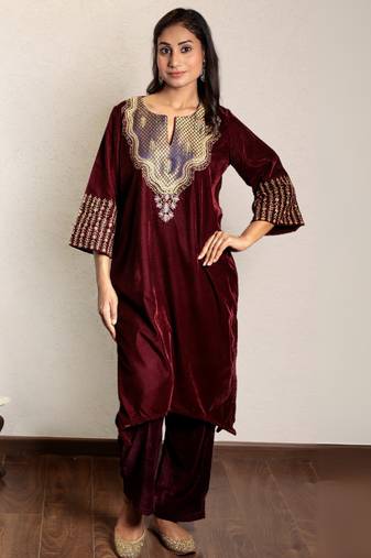 Wine embroidered velvet kurta with yoke detail and velvet pants, stitched