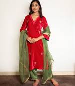 Fuschia pink hand embroidered velvet kurta with mashru silk pants and green dupatta, stitched