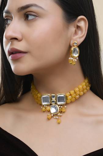"yellow beaded mirror work necklace set with earrings