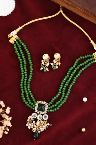 "green beaded kundan necklace set with pearl drops
