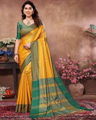 Yellow silk blend heavy border saree with contrast blouse 1