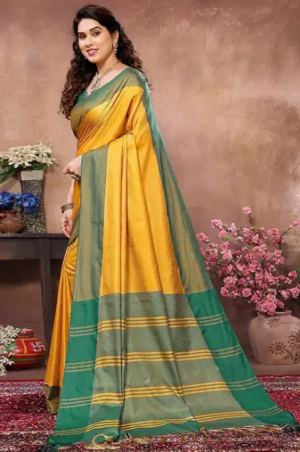 Yellow silk blend heavy border saree with contrast blouse