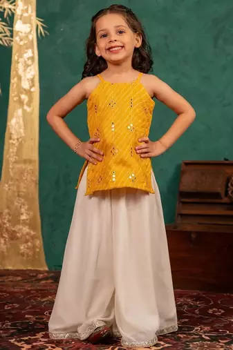 Girls moonga mirror work yellow cotton ethnic sleeveless strap top with off-white palazzo (set of 2)