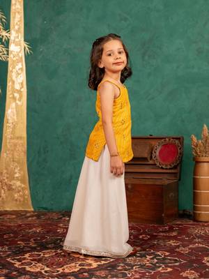 Girls moonga mirror work yellow cotton ethnic sleeveless strap top with off-white palazzo (set of 2) 2