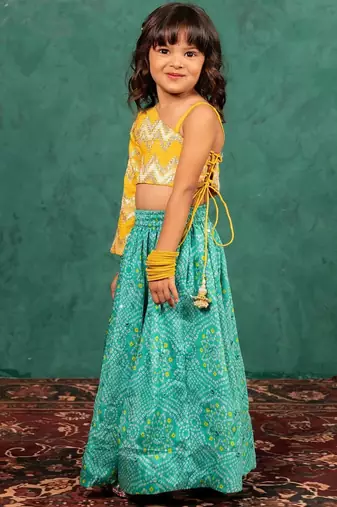 Girls one shoulder yellow top with bandhni mirror work lehenga (set of 2)