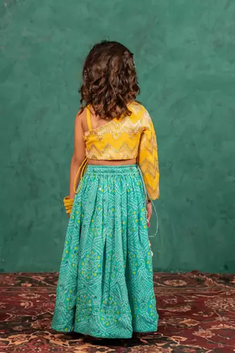 Girls one shoulder yellow top with bandhni mirror work lehenga (set of 2)