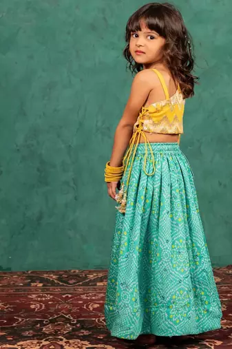 Girls one shoulder yellow top with bandhni mirror work lehenga (set of 2)