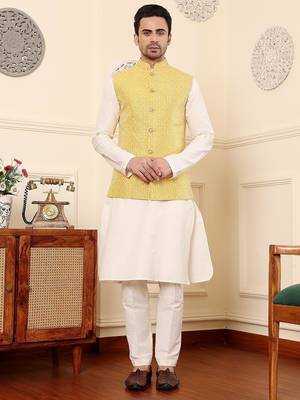 Yellow silk embroidered kurta pajama and nehru jacket for mens 1