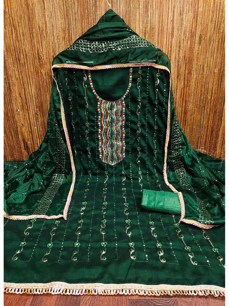 Trendy green vichitra silk salwar suit with chinon mirror work dupatta