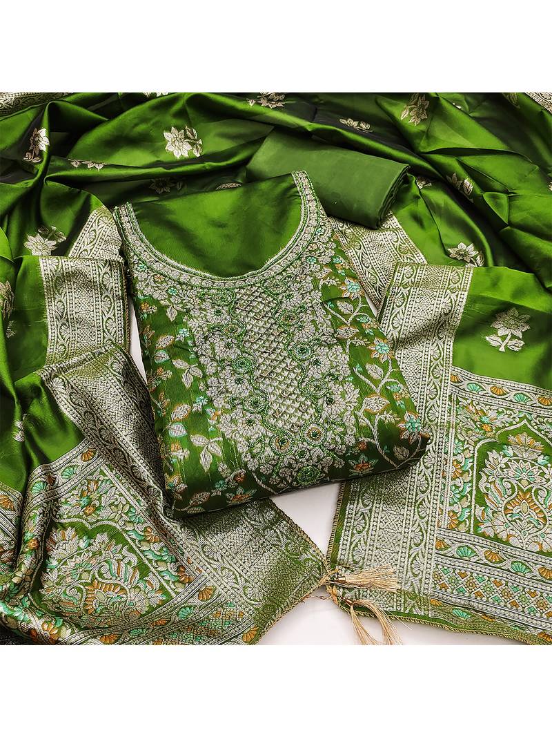 green jacquard salwar suit with heavy embroidery and rich dupatta