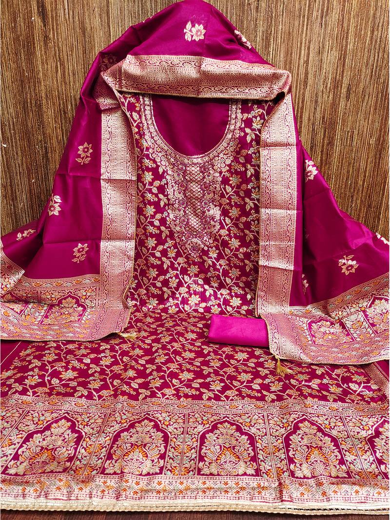 pink jacquard salwar suit with heavy embroidery and rich dupatta