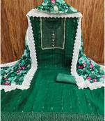 Graceful green roman silk salwar suit with floral georgette dupatta