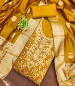 golden jacquard salwar suit with heavy embroidery and rich dupatta