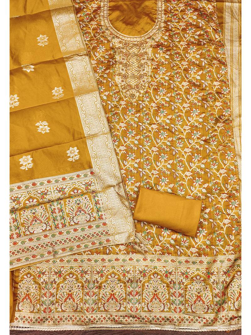 golden jacquard salwar suit with heavy embroidery and rich dupatta