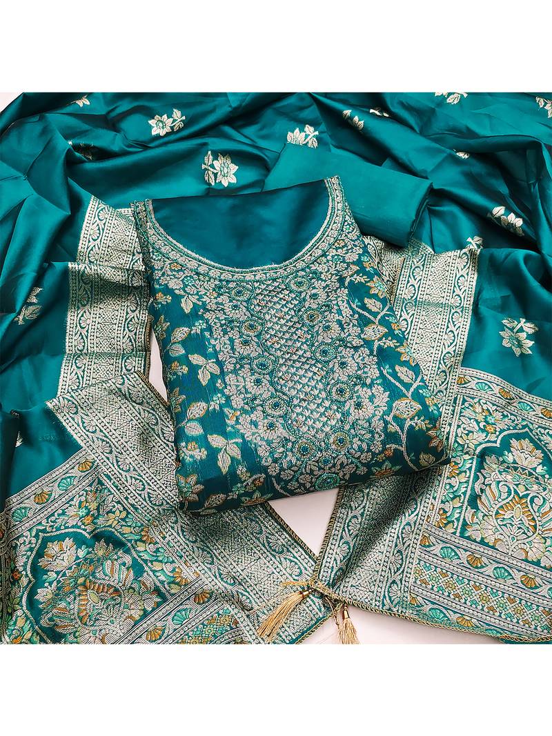 Elegant teal blue jacquard salwar suit with heavy embroidery and rich dupatta