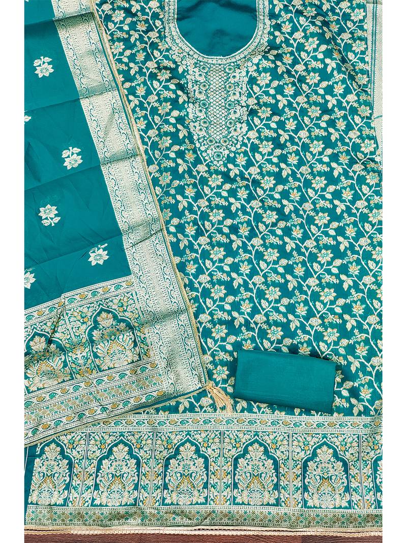 Elegant teal blue jacquard salwar suit with heavy embroidery and rich dupatta