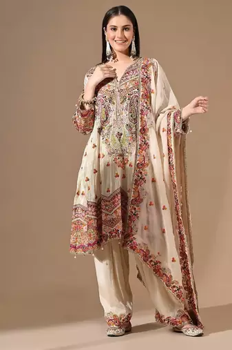 Golden cream kurta set with farshi salwar & zardozi work