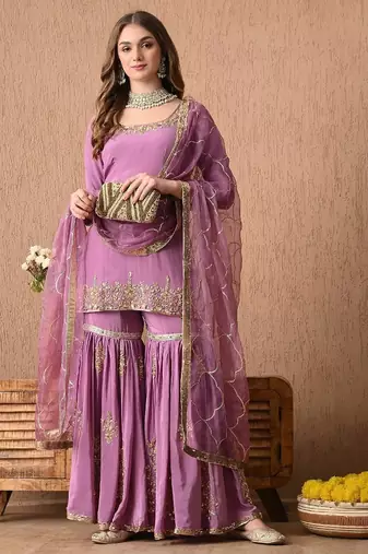 Breathtaking purple sharara set with zardozi and sequins work
