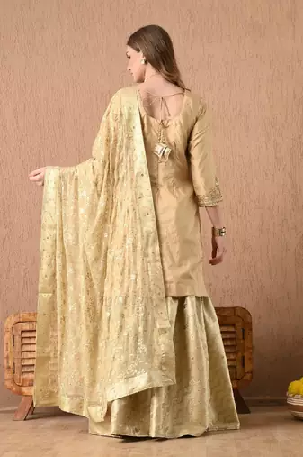 Mesmerising golden sharara set with gotta zardozi and sequins work