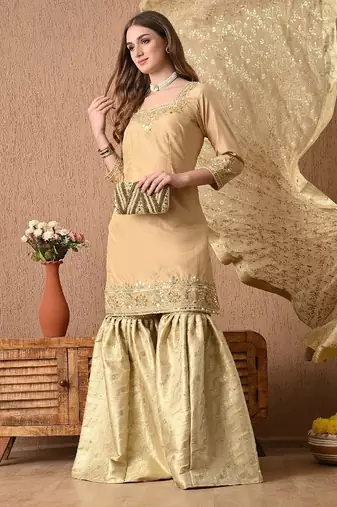 Mesmerising golden sharara set with gotta zardozi and sequins work