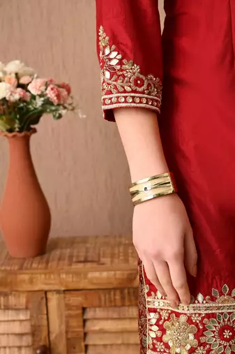 Sophesticated maroon sharara set with gotta zardozi and sequins work