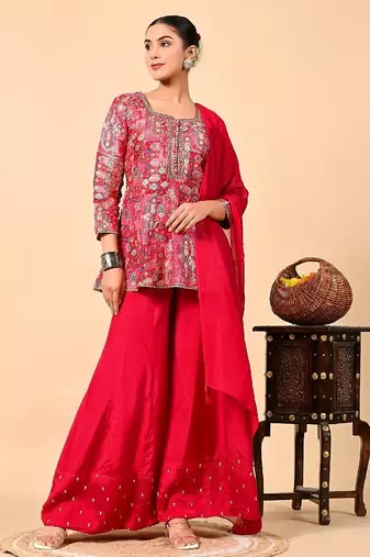 Reddish pink sharara set with peplum on kurta and thread work