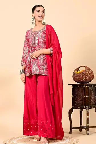 Reddish pink sharara set with peplum on kurta and thread work