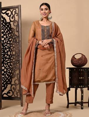 Greenish brown hue kurta set with zardozi cutdana and pearl work 1