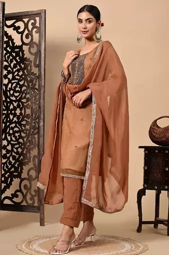 Greenish brown hue kurta set with zardozi cutdana and pearl work