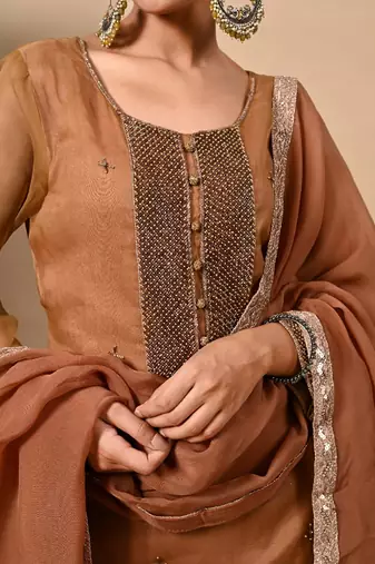 Greenish brown hue kurta set with zardozi cutdana and pearl work