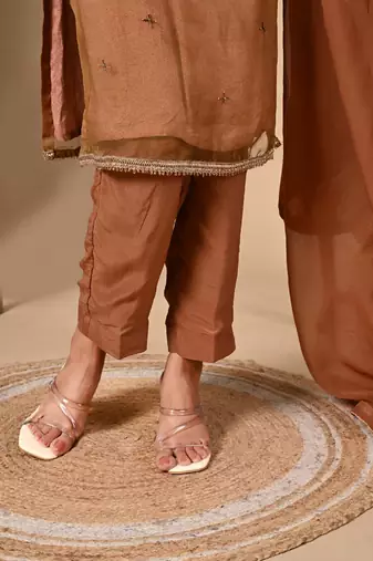 Greenish brown hue kurta set with zardozi cutdana and pearl work