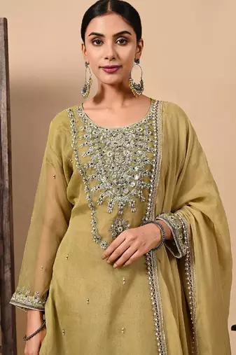 Mehndi green kurta set with  zardozi dabka and sequins work