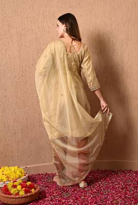 Golden green kurta set with zardozi dabka thread and sequins work 1