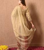 Golden green kurta set with zardozi dabka thread and sequins work