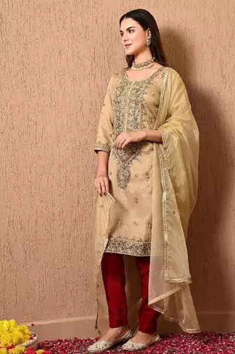 Golden green kurta set with zardozi dabka thread and sequins work