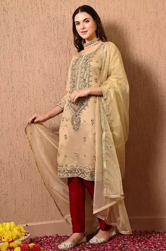 Golden green kurta set with zardozi dabka thread and sequins work